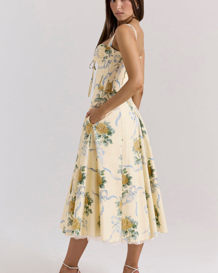 Front view of cream floral sweetheart midi dress with blue ribbon print and fitted bodice