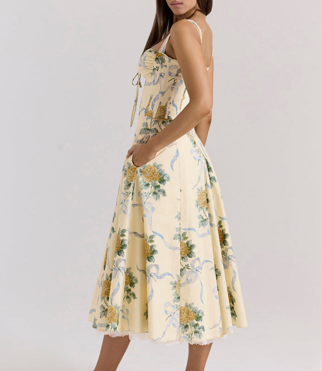 Front view of cream floral sweetheart midi dress with blue ribbon print and fitted bodice