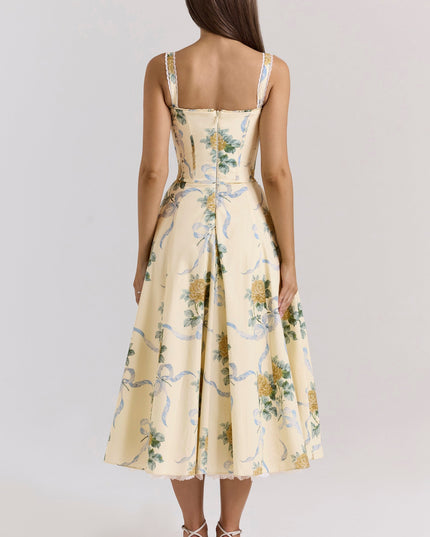 Back view of cream floral midi dress with open back, lace trim, and flared wedding guest style