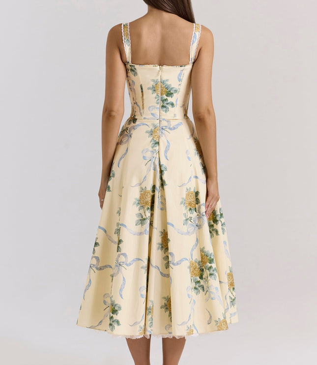 Back view of cream floral midi dress with open back, lace trim, and flared wedding guest style