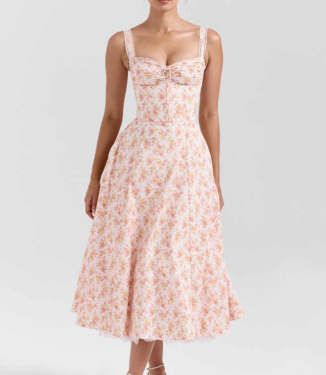 Front view of floral sweetheart midi dress with lace straps and bow detail for wedding guest wear