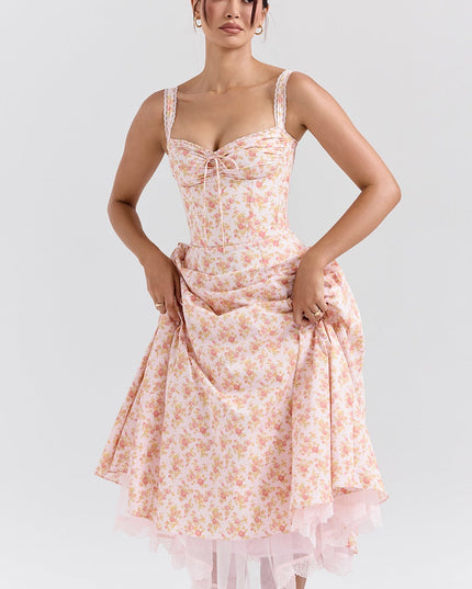 Front view of floral sweetheart midi dress with lace straps, ruched bust, and A-line skirt