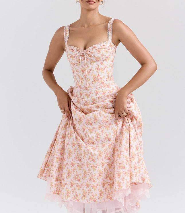 Front view of floral sweetheart midi dress with lace straps, ruched bust, and A-line skirt