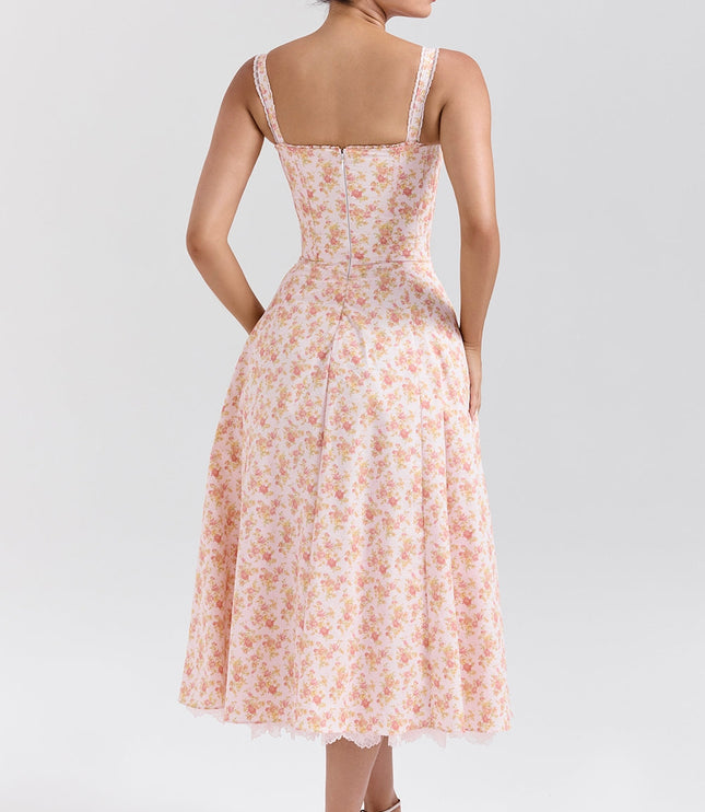 Floral midi dress shown with gathered skirt lifted to reveal lace trim and layered hem detail