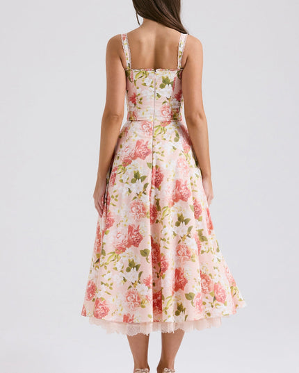 Side view of floral wedding guest midi dress with corset-style bodice and full skirt