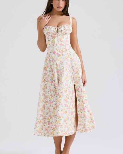 Front view of white floral midi dress with sweetheart neckline, slit skirt, and straps