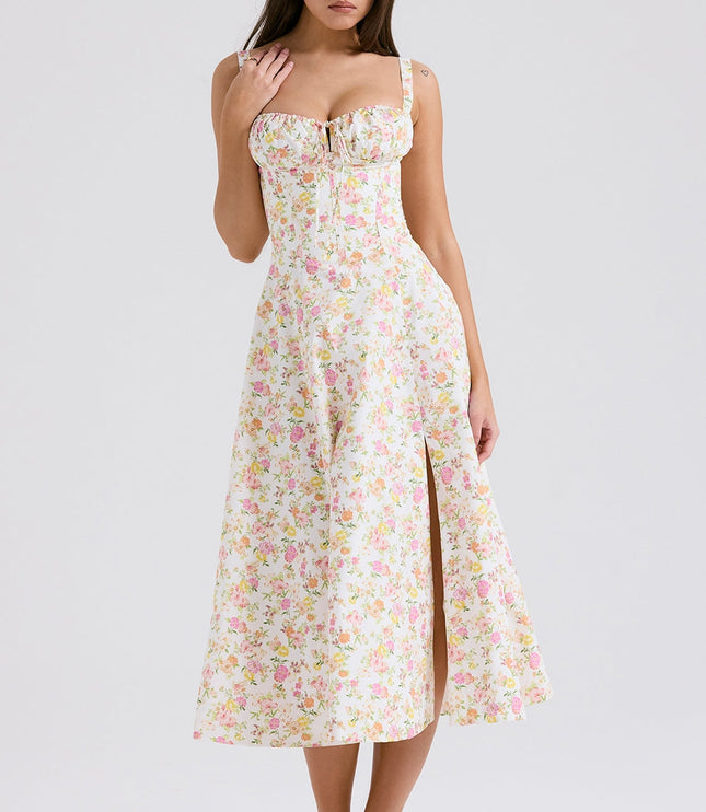Front view of white floral midi dress with sweetheart neckline, slit skirt, and straps