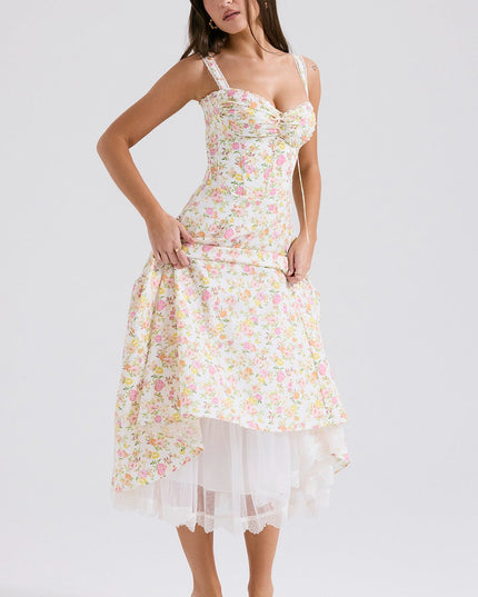 Floral midi dress with sweetheart top and layered tulle hem, styled as a wedding guest dress