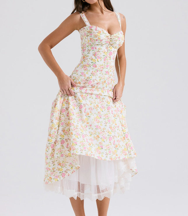 Floral midi dress with sweetheart top and layered tulle hem, styled as a wedding guest dress