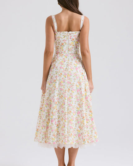 Back view of floral midi dress with wide straps and lace hem, women's wedding guest dress