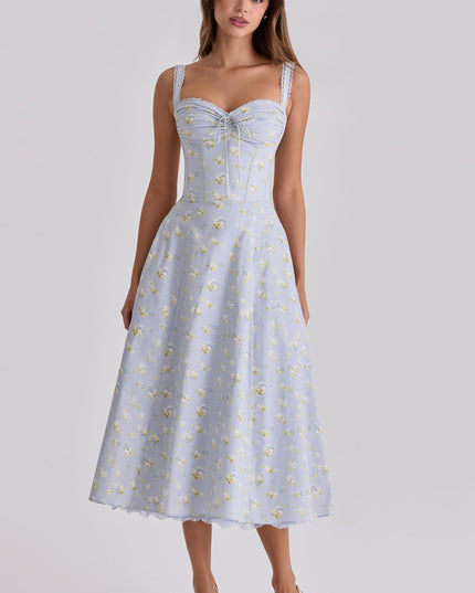 Side view of light blue floral midi dress with sweetheart neckline and corset seams