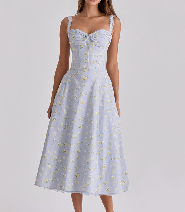 Side view of light blue floral midi dress with sweetheart neckline and corset seams