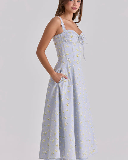 Front view of pink floral sweetheart midi dress with ruched bust and straps
