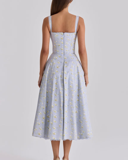Side front view of pink floral midi dress with corset bodice and hidden pockets