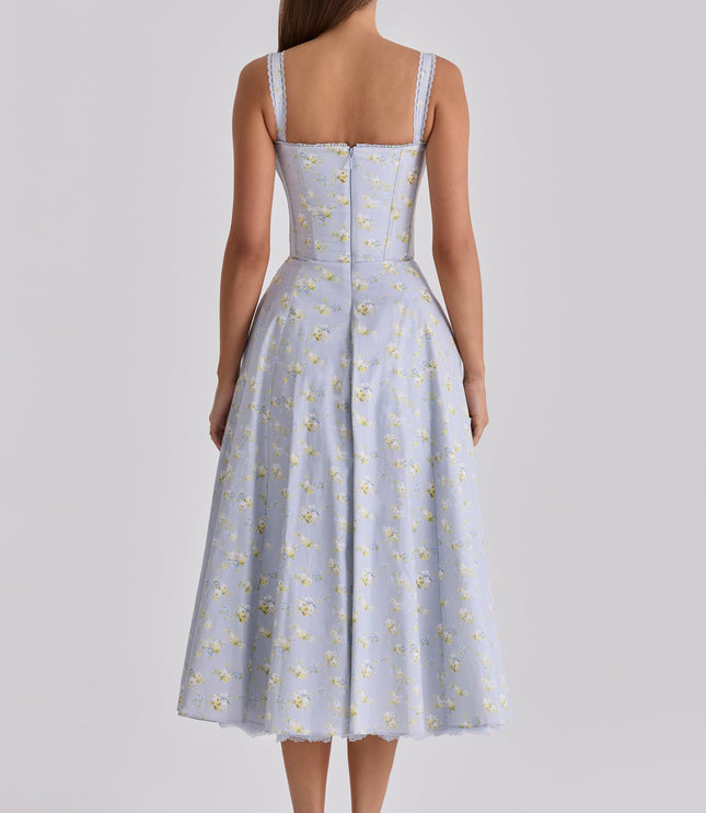Side front view of pink floral midi dress with corset bodice and hidden pockets