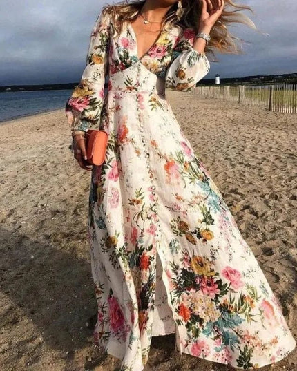 Women's floral V neck long sleeve maxi dress with flowing skirt and pastel print