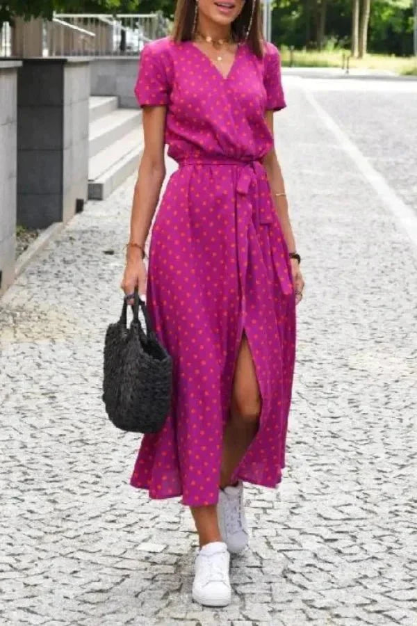 Women's magenta polka dot V neck midi dress with short sleeves, tie waist and front slit