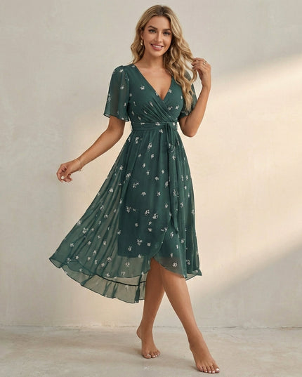 Dark green floral V neck mini dress with short sleeves and wrap waist detail