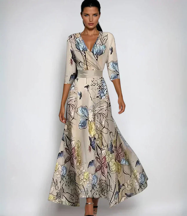 Beige floral maxi dress with V neck, three quarter sleeves, and flowing skirt
