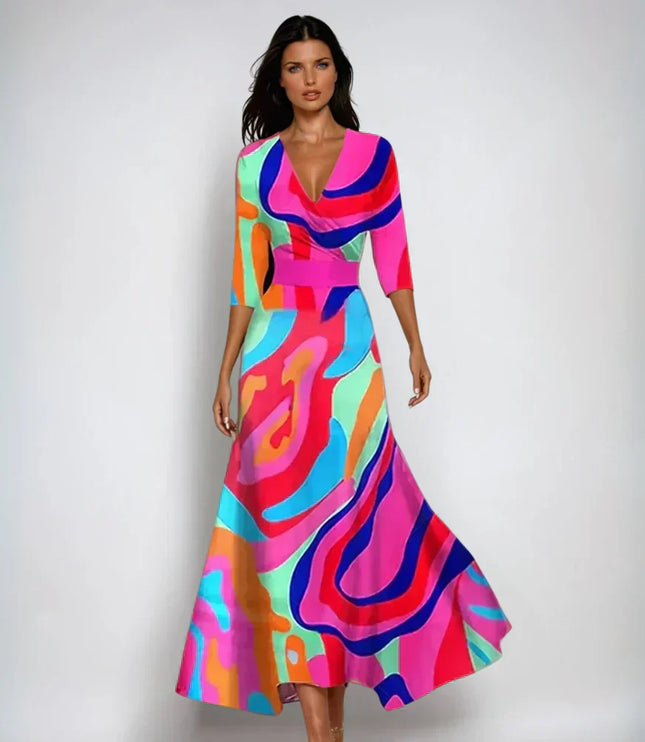 Colorful floral maxi dress with V neck, three quarter sleeves, and vibrant abstract print