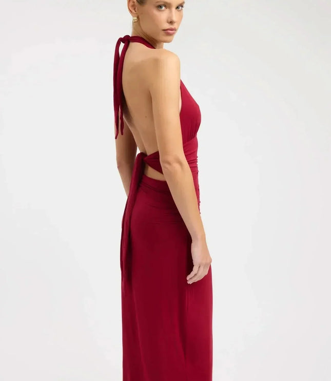 Back view of burgundy formal maxi halter dress with open back and tie straps
