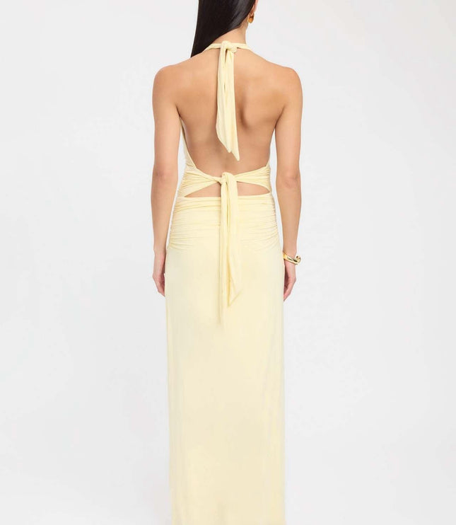 Front view of blue formal maxi halter dress with ruched bodice and floor length skirt
