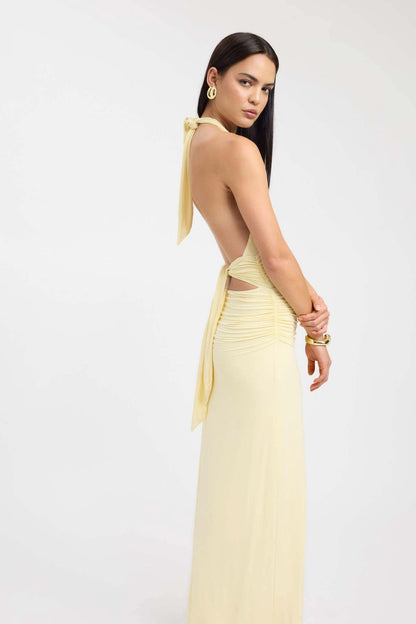 Close front view of a red formal maxi dress with halter top and gathered bodice