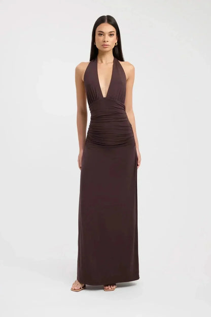 Front view of a dark brown halter maxi dress with deep V neckline and ruched waist
