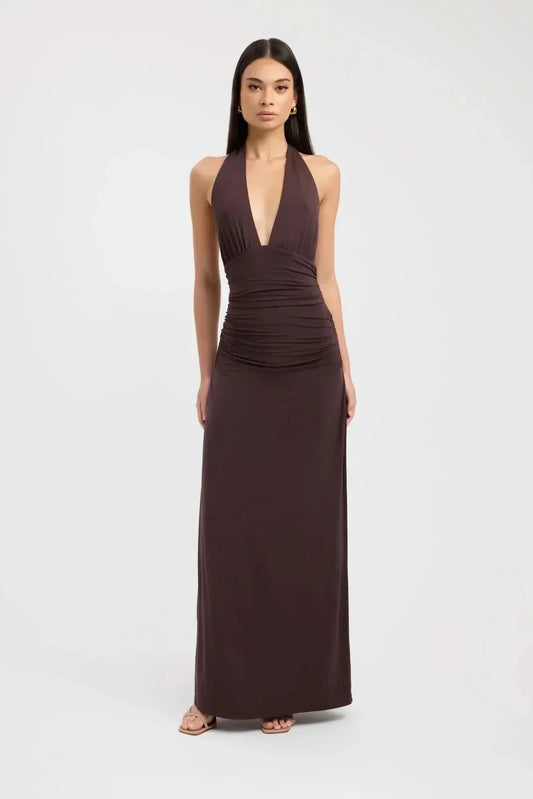 Front view of a dark brown halter maxi dress with deep V neckline and ruched waist