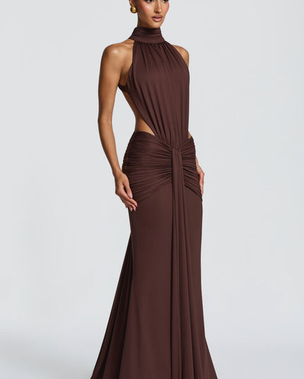 Back view of brown formal maxi dress with open back and ruched hip detail