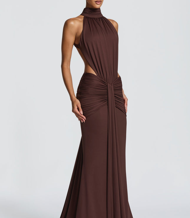 Back view of brown formal maxi dress with open back and ruched hip detail