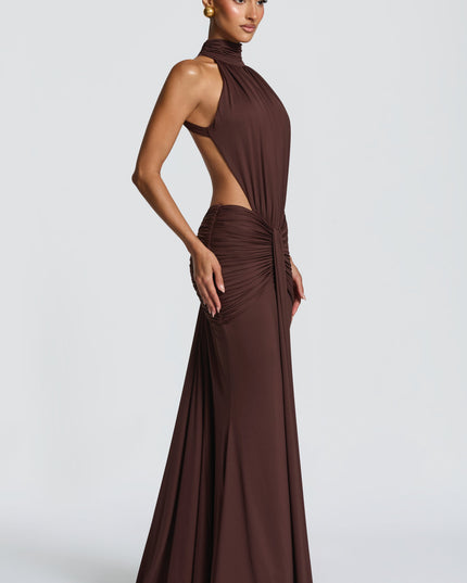 Close-up front of brown ruched halter dress with gathered waist and side cutouts
