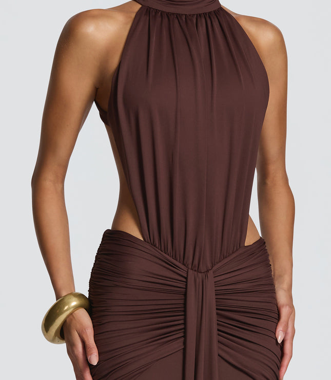 Rear view of brown formal maxi dress with low open back and ruched skirt
