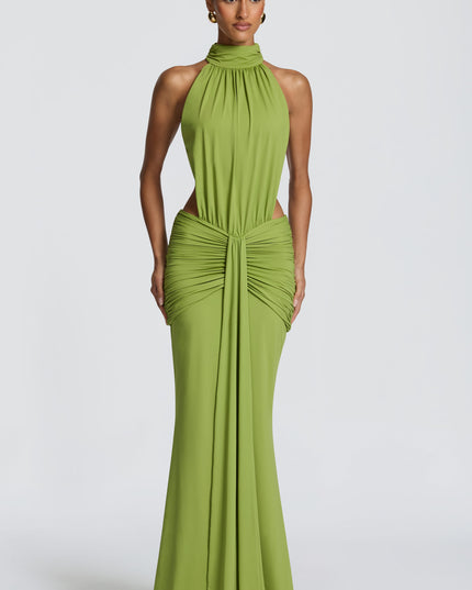 Front view of green ruched halter maxi dress with high neckline and side cutouts