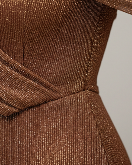 Back view of brown formal maxi dress with one shoulder drape and sleek fitted skirt