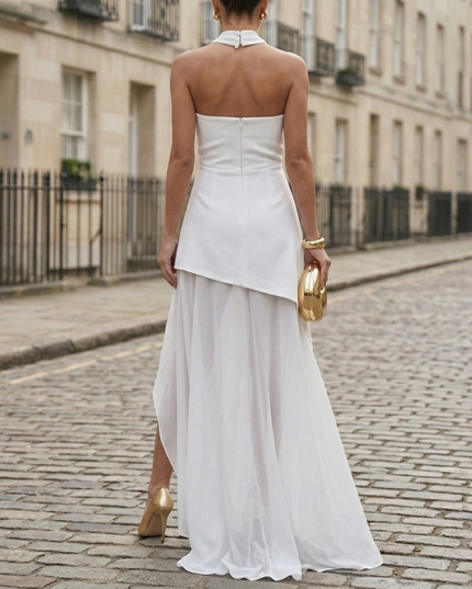 Back view of white formal maxi dress with strapless neckline and slit