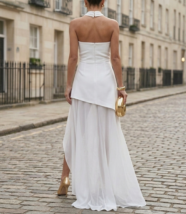 Back view of white formal maxi dress with strapless neckline and slit