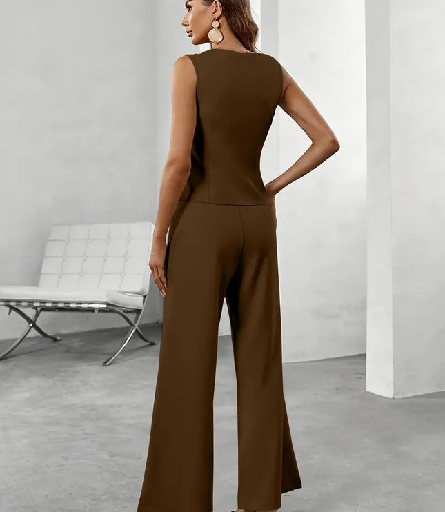 Black sleeveless vest and wide leg pants set shown in a bright formal room with tailored fit