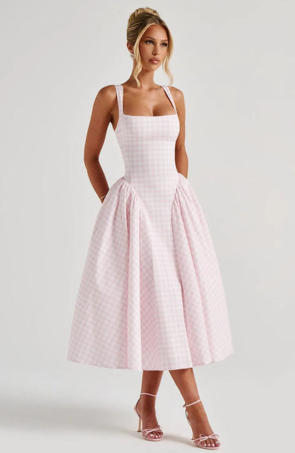 Front view of pink checkered square neck midi dress with pleated skirt
