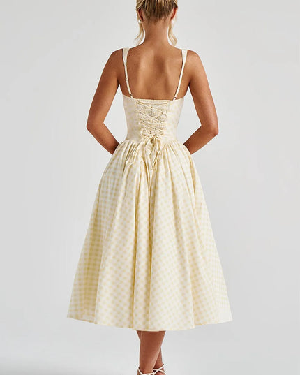 Back view of cream gingham midi dress with lace-up corset bodice