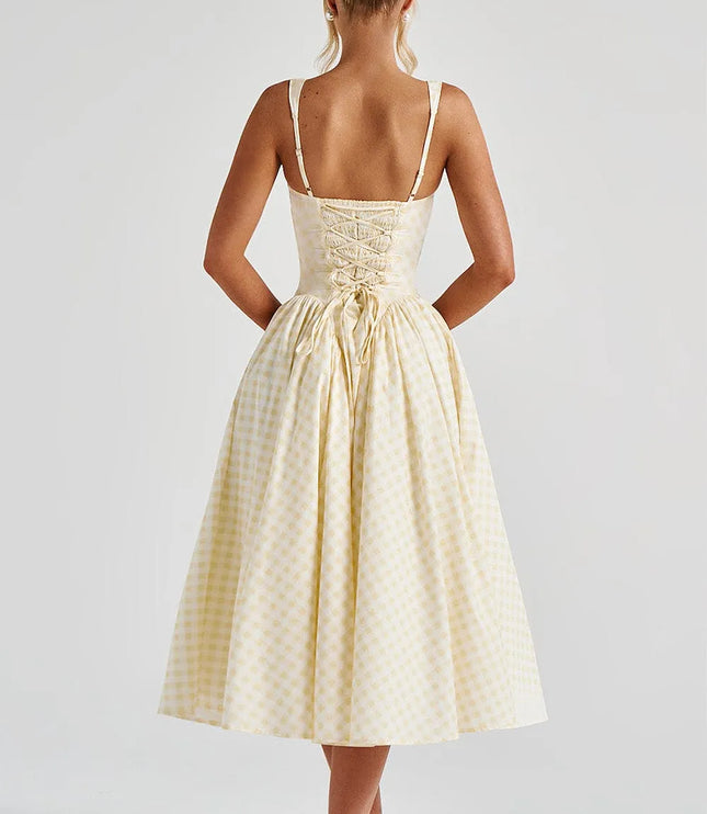 Back view of cream gingham midi dress with lace-up corset bodice