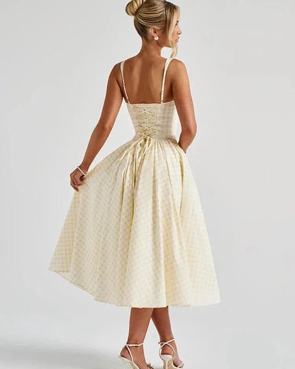 Pink gingham square neck midi dress front view with pleated skirt and pockets