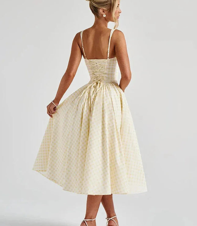 Pink gingham square neck midi dress front view with pleated skirt and pockets