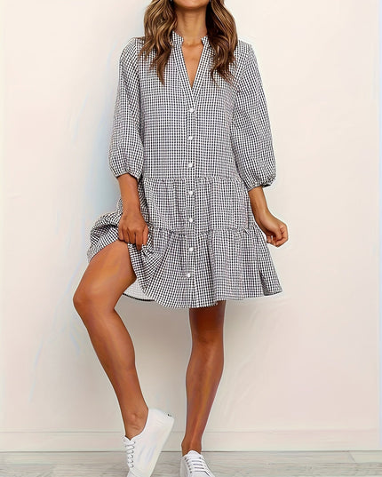 Black gingham V neck mini dress with long puff sleeves and button front detail