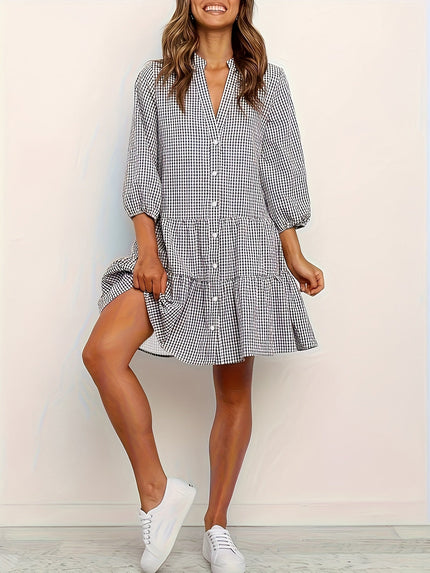 Black gingham V neck mini dress with long puff sleeves and button front detail