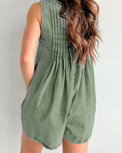 Back view of olive green mini denim romper with gathered pleats, sleeveless design, and loose shorts