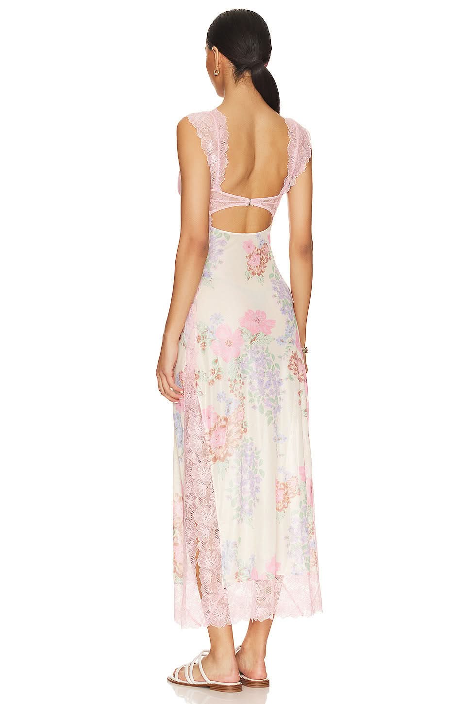 Back view of floral cutout midi dress with pink lace straps and open-back detail