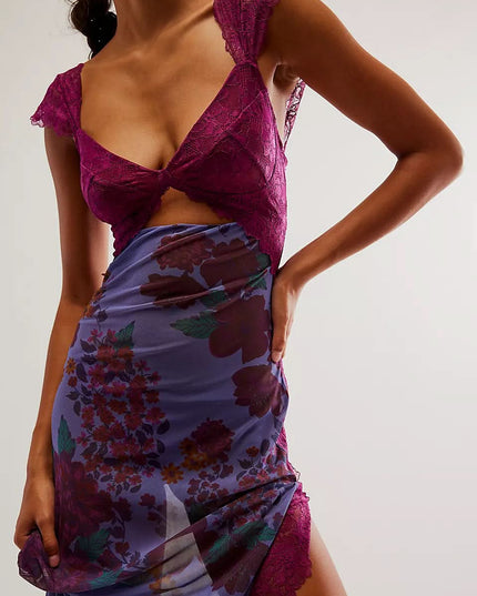 Close-up of purple floral midi dress showing lace top, cutout waist, and ruched skirt detail