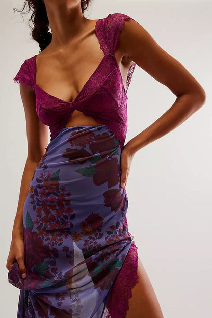 Close-up of purple floral midi dress showing lace top, cutout waist, and ruched skirt detail