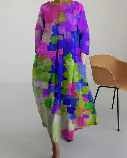 Women's abstract print long sleeve maxi dress in pink, purple, green, and blue with loose flowy fit